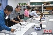 夫妻婚姻两岸艺术家在安徽“共绘一幅画”